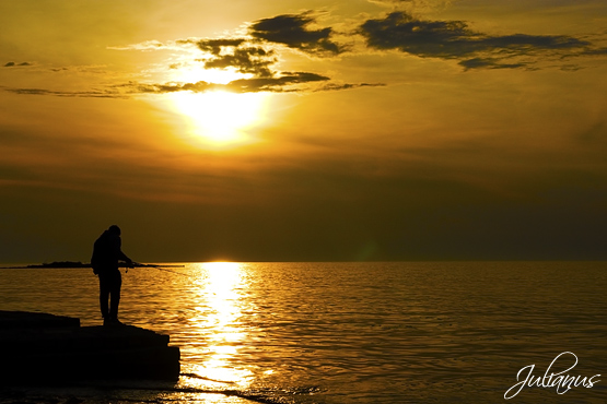 Fisherman at sunset